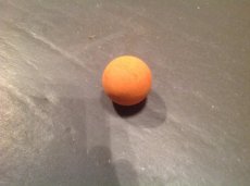 Bal oranje Jupiter geruwd (schuift niet) 1 STUK
